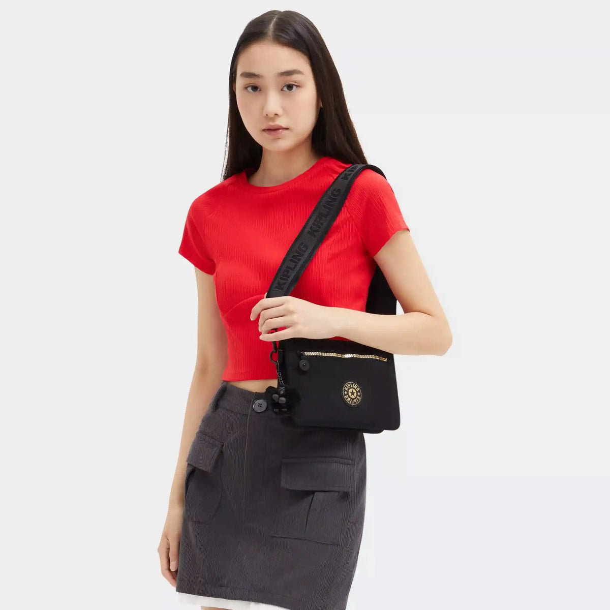 Riri Zip Crossbody Bag